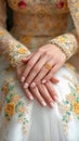 Expectant elegance Womens hands folded, awaiting the wedding and groom