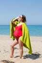 Expectant mother resting at the sea