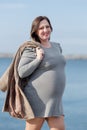 Expectant mother on seafront Royalty Free Stock Photo