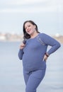 Expectant mother on seafront Royalty Free Stock Photo