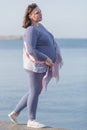 Expectant mother on seafront Royalty Free Stock Photo