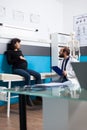 Expectant woman talking to doctor at checkup appointment Royalty Free Stock Photo