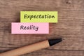 Expectation vs reality text on paper note Royalty Free Stock Photo