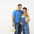 Expecting couple painting. Royalty Free Stock Photo