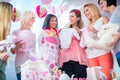 Expecting Mother with presents on baby shower party Royalty Free Stock Photo