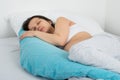 Expecting Woman Sleeping On Bed Royalty Free Stock Photo