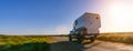 expedition camping van pick up truck on a dirt road on a sunny afternoon Royalty Free Stock Photo