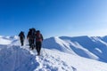 People hiking in the snow at Vardousia mountains in Central Greece- E4 path Royalty Free Stock Photo