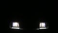 Expeditionary SUV switch on bright headlight and additional illumination.