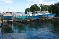 Expensive fishing boats on boat lifts at dock Royalty Free Stock Photo