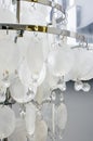 Expensive exquisite crystal chandelier in Classical style. Vertical photography Royalty Free Stock Photo