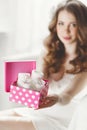 Expensive gift for a pregnant woman. Royalty Free Stock Photo