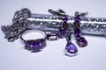 Expensive set of silver women`s jewelry with violet stones - ring, pendant and earrings. , copy space