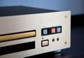 Expensive Stereo CD Player with Golden Front Panel Plays Music on Compact Disk