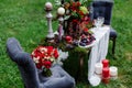 Expensive, trendy wedding bouquet of roses in marsala and red colors standing on chair. Bridal details and decor with flowers Royalty Free Stock Photo