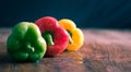 Expensive vegetables - red, yellow and green peppers (capsicums Royalty Free Stock Photo