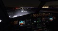Airplane Cockpit View at Night Illuminated. Royalty Free Stock Photo