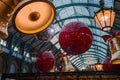 Experience the Christmas Spirit with Shiny Baubles and Bells in Covent Garden, London Royalty Free Stock Photo