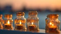 Twilight Illumination: Closeup Macro of Candles in Ornate Glass Jars at the Seafront Royalty Free Stock Photo