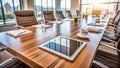 Modern Office Collaboration Space Sleek Tablet on Polished Conference Table Showcasing a Vibrant Cityscape View Royalty Free Stock Photo