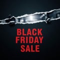 Torn paper reveals fiery black friday sale announcement with intense red text and dramatic lighting Royalty Free Stock Photo