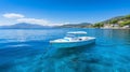 A White and Blue Boat Sailing on the Open Sea Royalty Free Stock Photo