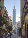 Urban Majesty: Taipei 101 Tower Rising Amidst City Alleyways. Royalty Free Stock Photo