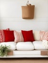 Sleek Red Pillow on White Sofa Mockup Royalty Free Stock Photo