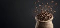 Experience the Intriguing Splendor of Organic Coffee Beans Dancing Out of a Burlap Sack Royalty Free Stock Photo