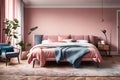 the modern charm of a spacious bedroom, adorned with a grey armchair against a captivating pink wall. The bed, adorne Royalty Free Stock Photo