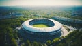 Eco-Friendly Stadium Teeming with Fans, Solar Panels, and Greenery Drone Photo