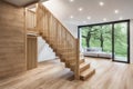 Modern natural ash tree wooden stairs in new house interior Royalty Free Stock Photo