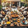 Spanish Style Outdoor Dining: Paella and Authentic Dishes on Wooden Table