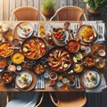 Spanish Style Outdoor Dining: Paella and Authentic Dishes on Wooden Table Royalty Free Stock Photo