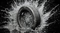 Dynamic Car Wheel: A Close-Up of Water Splashing in Motion