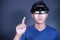 Experience VR hololens headset in studio with advanced technology. Body gesture when using virtual reality glasses Royalty Free Stock Photo
