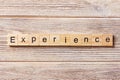 Experience word written on wood block. experience text on table, concept Royalty Free Stock Photo