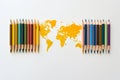 Colored pencils with world map on white background. Top view Ai generative Royalty Free Stock Photo