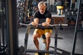 Fit mature man performing strength training for biceps Royalty Free Stock Photo
