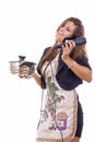 Experienced business woman cooking and talking on the phone Royalty Free Stock Photo