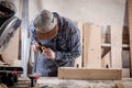 Experienced carpenter work with wooden Royalty Free Stock Photo