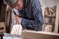 Experienced carpenter work with wooden Royalty Free Stock Photo