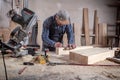 Experienced carpenter work with wooden Royalty Free Stock Photo