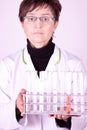 Experienced Doctor holding Test Tubes Royalty Free Stock Photo