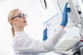 Experienced female scientist is doing her research Royalty Free Stock Photo