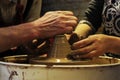 experienced master potter teaches the art of making pots clay on the's wheel