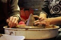 experienced master potter teaches the art of making pots clay on the's wheel