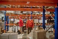 Experienced staff working in the storage area Royalty Free Stock Photo