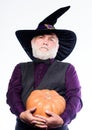 Experienced and wise. Halloween tradition. Wizard costume hat Halloween party. Magician witcher old man. Senior man Royalty Free Stock Photo