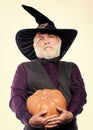 Experienced and wise. Halloween tradition. Wizard costume hat Halloween party. Magician witcher old man. Senior man Royalty Free Stock Photo